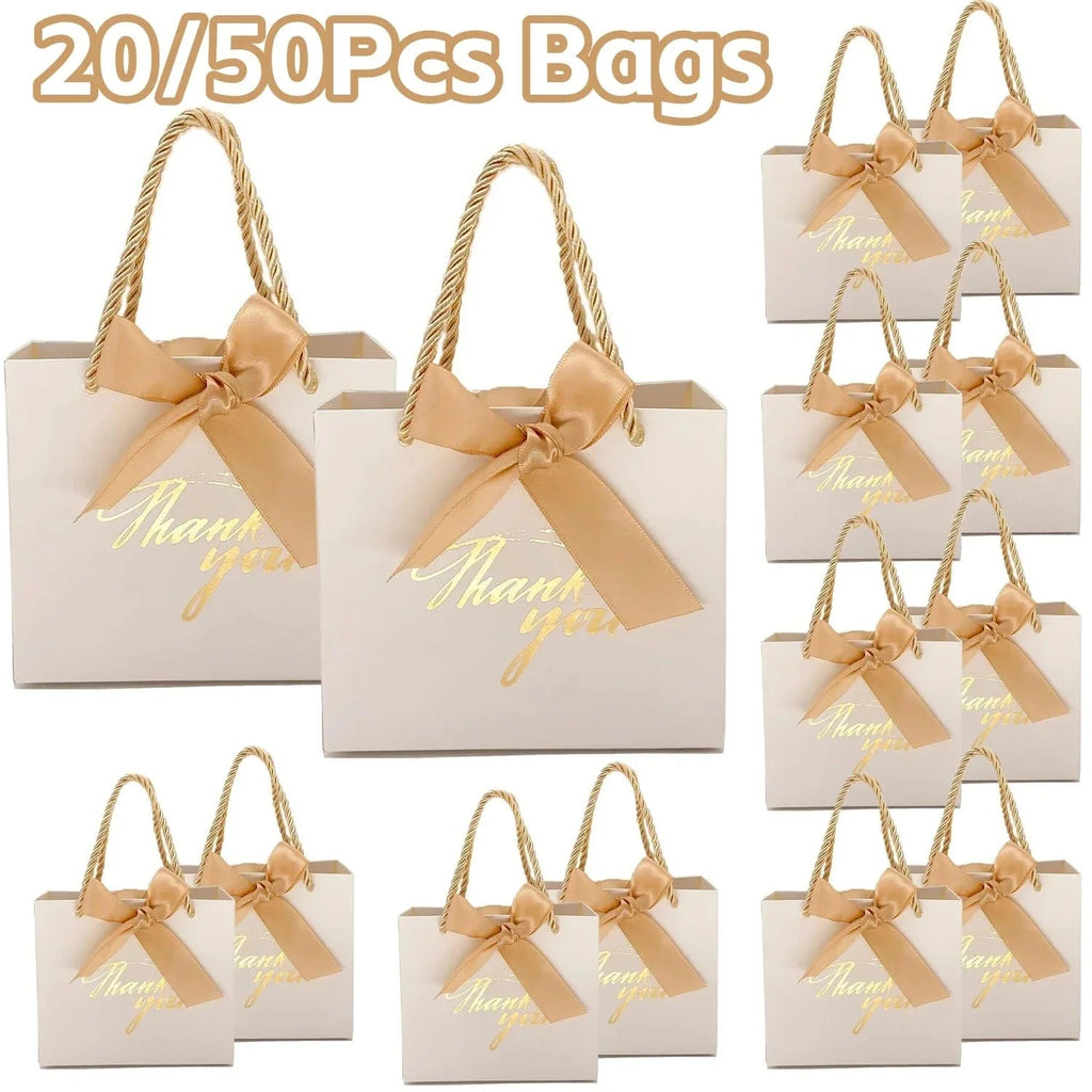 Small paper thank you gift bags with handles from Showlu Fashion, perfect for occasions, in a pack of 20 or 50.