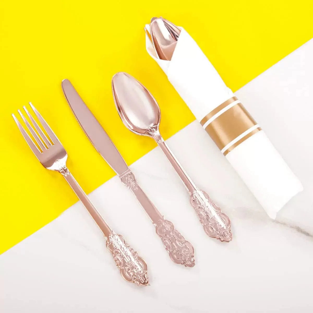 Showlu Rose Gold disposable plastic cutlery set with knife, fork, spoon, and napkins for party tableware, three-piece set.