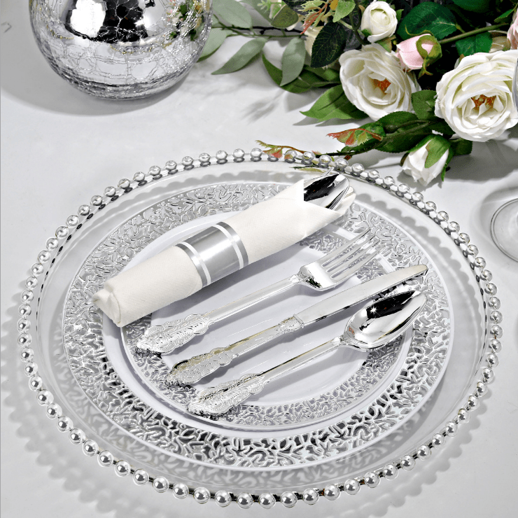 Rose gold disposable plastic cutlery set with napkins, includes knife, fork, and spoon, perfect for parties and gatherings.
