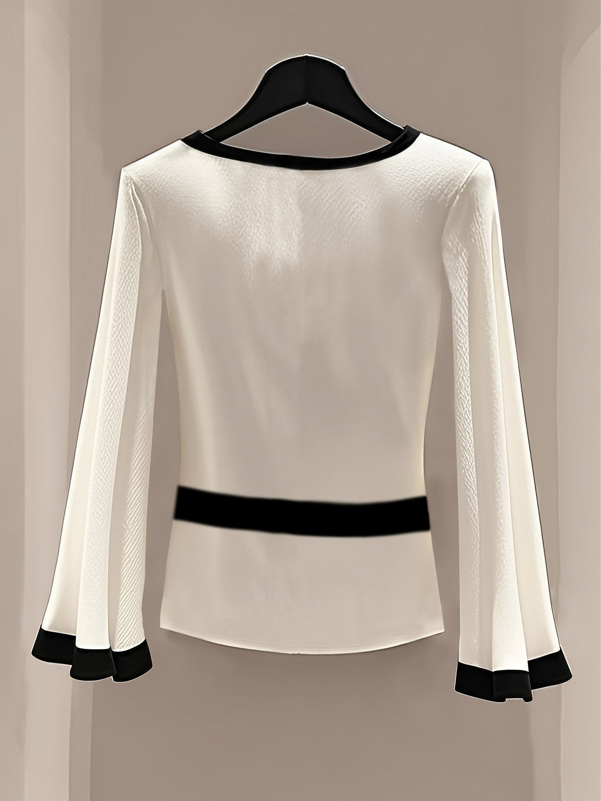 White round neck blouse with flared sleeves from Showlu Fashion, ideal as a stylish knit top for casual or dressy occasions.