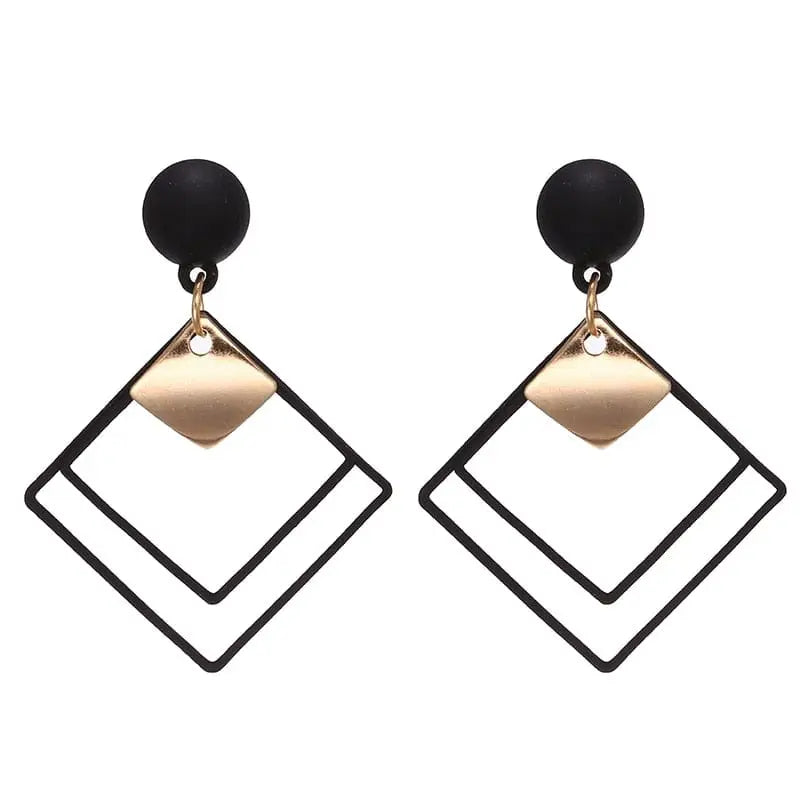 Korean Showlu geometric triangle tassel dangle earrings for women, featuring long statement jewelry with triangle and tassel design