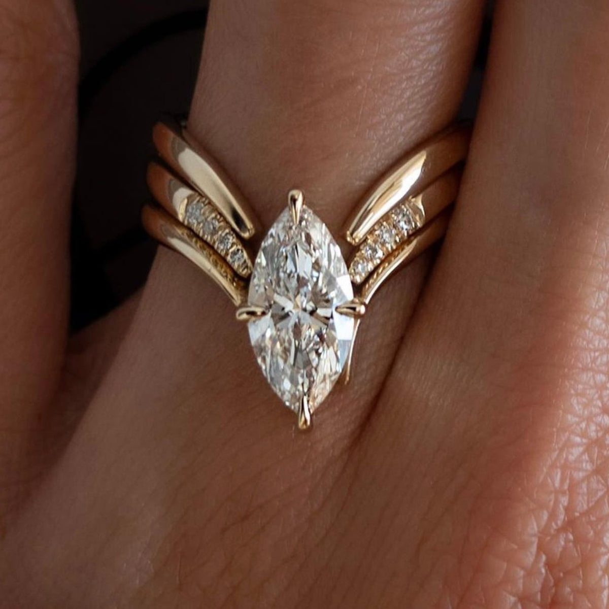 Showlu Fashion 2CT marquise moissanite ring in 18K gold-plated S925 silver jewelry, featuring a sparkling marquise-cut stone.
