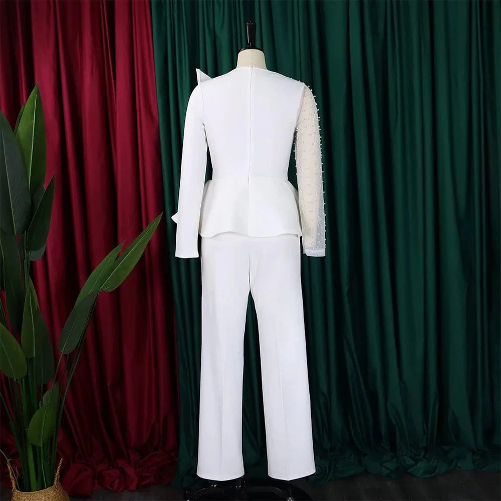 Elegant women's beaded high-waisted party jumpsuit with round neck and transparent sleeves by SHOWLU FASHION.