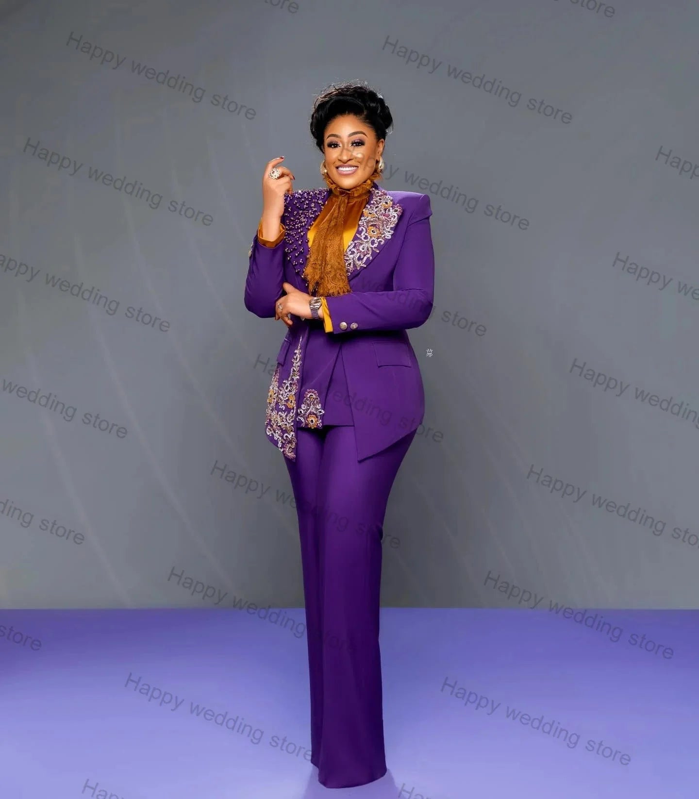 Purple women's 2-piece blazer suit with crystal embellishments, including tailored jacket and trousers, perfect for wedding or party attire.