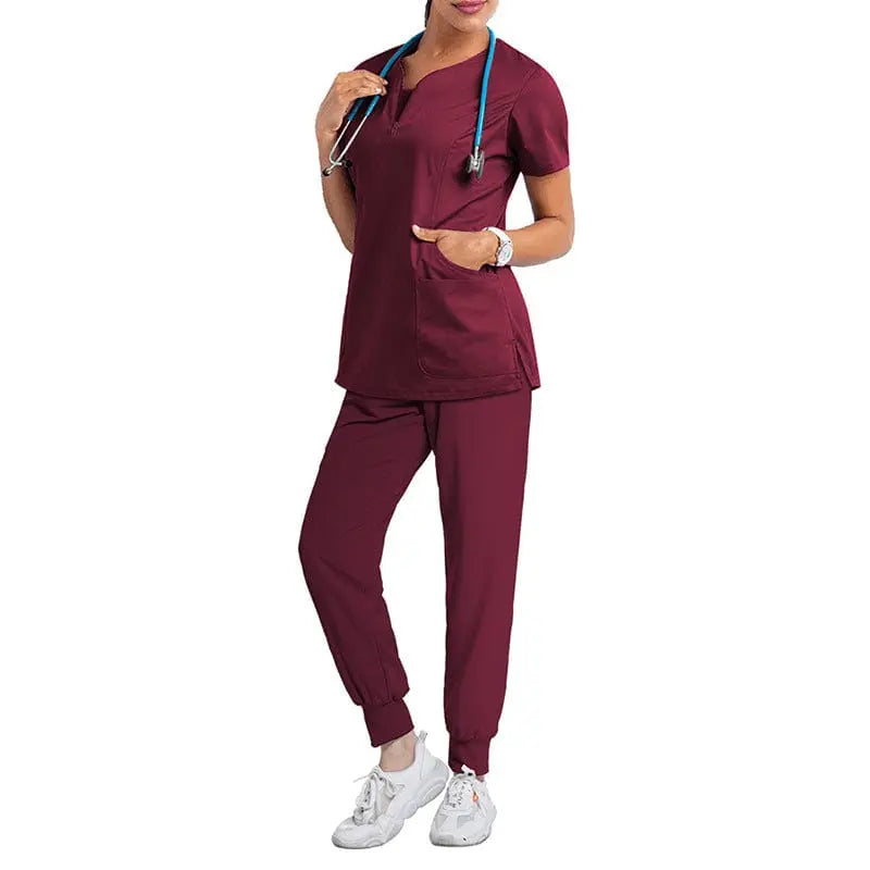 Showlu Fashion women's burgundy medical scrub set with short sleeves, hospital nurse uniform, including top and pants, for healthcare professionals.