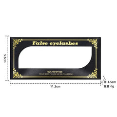 A rectangular black eyelash packaging box with gold trim and dimensions of 11.3cm by 5.5cm.