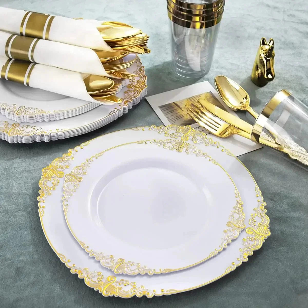 Gold-plated embossed PS plastic tableware set with plates, knives, forks, and spoons for parties, by Showlu Fashion Store.