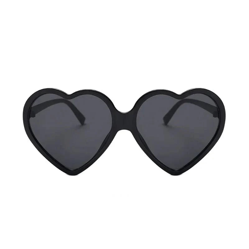 Red retro heart-shaped sunglasses for women with UV400 mirror lenses, stylish candy-colored shades.