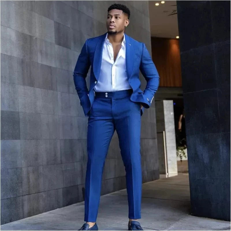 Royal blue slim fit men's suit by SHOWLU FASHION STORE, cotton blend tuxedo with blazer and pants for formal or wedding occasions.