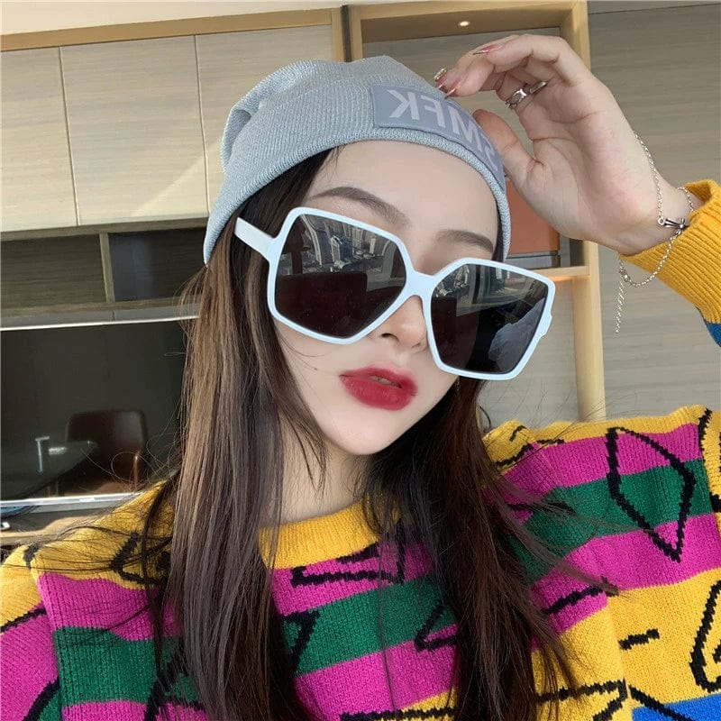 Showlu Women's Oversized Square Polarized Sunglasses with UV protection, trendy fashion accessory for stylish sun protection.