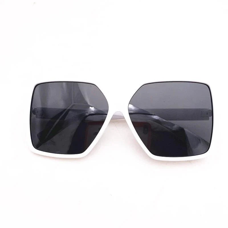 Showlu Women's Oversized Square Polarized Sunglasses with UV protection, trendy design, and fashionable oversized frame.