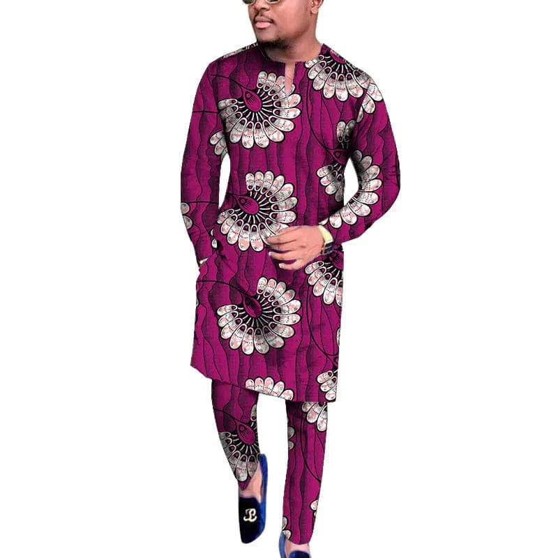 Men's African wax print V-neck shirt and trousers set in traditional style, featuring vibrant patterns for wedding or party wear.