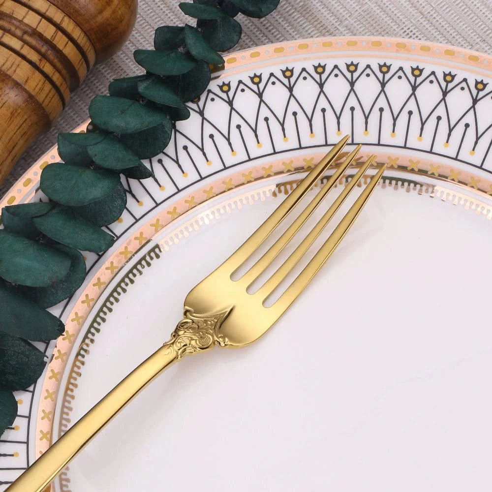Nordic Relief Golden stainless steel Western tableware set with knife, fork, and spoon, featuring a sleek, modern design.