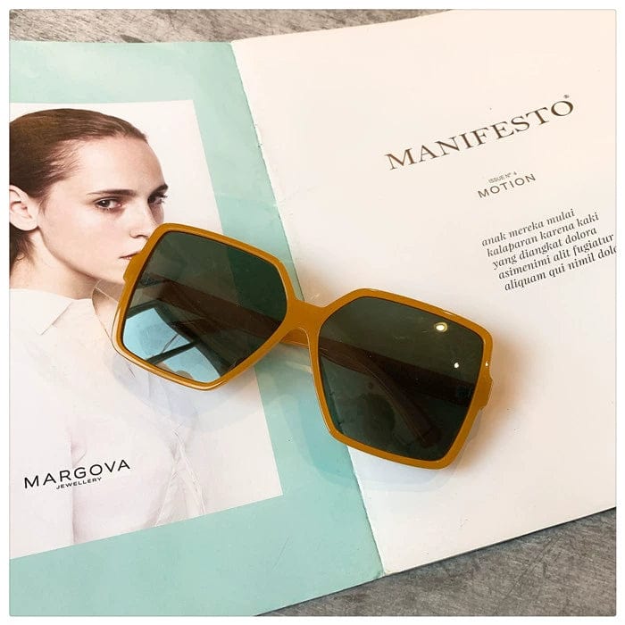 Showlu women's oversized square polarized sunglasses with orange frame and dark green lenses, offering UV protection and trendy style.