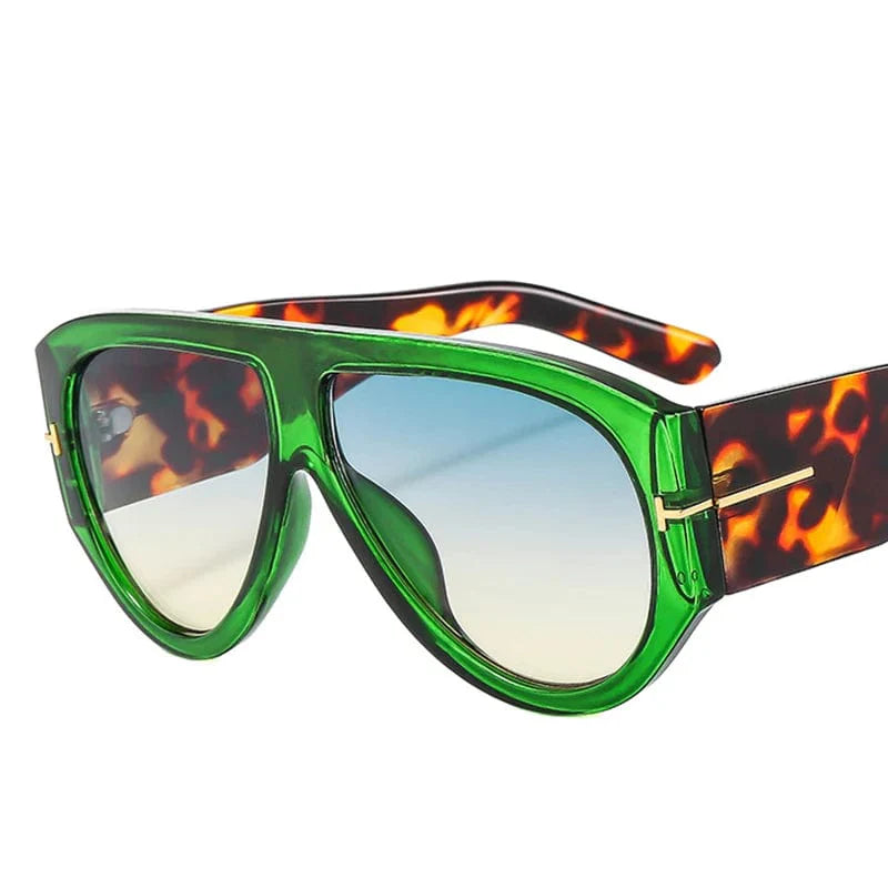 Women's oversized pilot sunglasses by Showlu Fashion with gradient lenses, thick frame, and UV400 protection, stylish retro design.