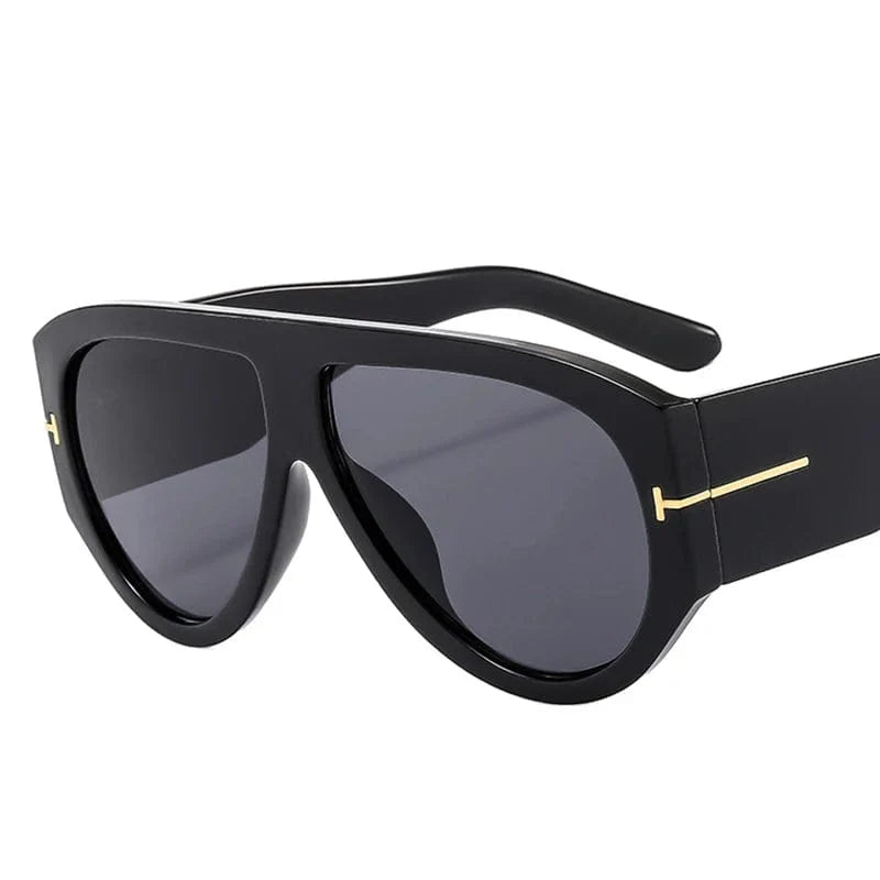 Women's oversized pilot sunglasses by Showlu Fashion with luxury gradient lenses, thick frame, and UV400 protection.