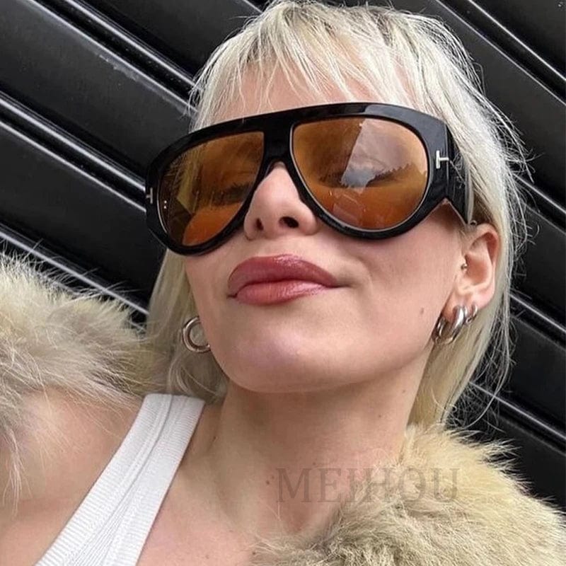 Women's oversized pilot sunglasses with gradient lenses and thick frames, featuring a luxury retro style in UV400 protection.