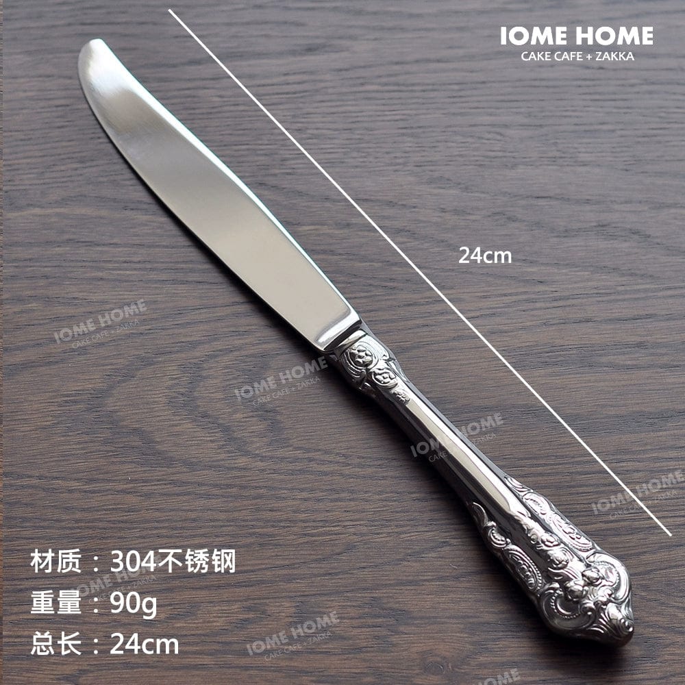 Showlu French retro relief stainless steel main meal and dessert spoon and fork set, elegant and polished for dining.