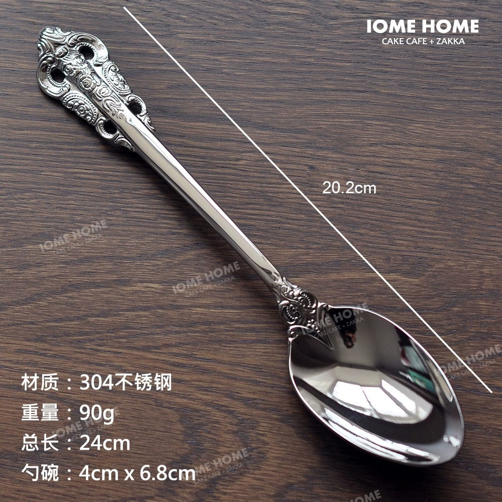 Showlu French Retro Relief stainless steel main meal and dessert spoon and fork set with intricate relief design.