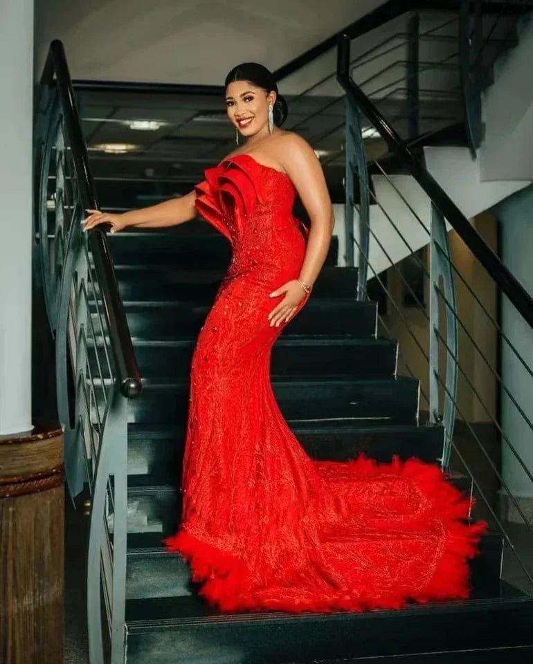 Vinca Sunny Aso Ebi mermaid prom dress by SHOWLU FASHION with beaded lace, sweetheart neckline, feathers, and lace-up back.