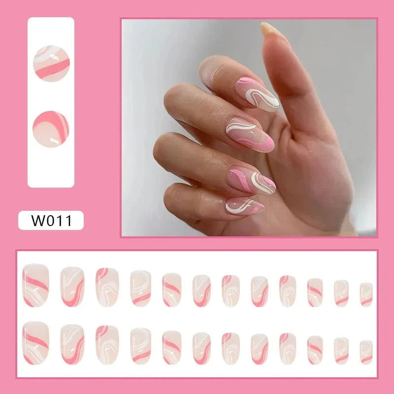 Purple floral almond press-on nails by Showlu Fashion Store, 24-piece set with detachable acrylic tips for a stylish manicure.