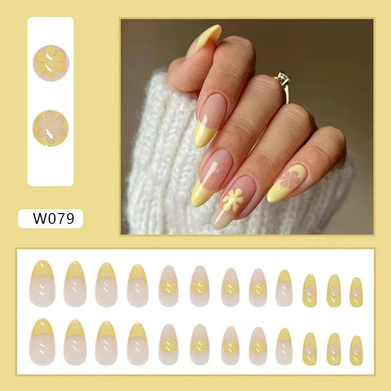 Purple floral almond press-on nails from Showlu Fashion Store, 24-piece set with detachable acrylic tips and elegant nail design.