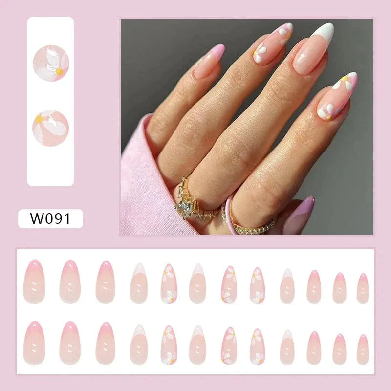 Showlu Purple Floral Almond Press-On Nails, 24-piece acrylic tips with floral design for easy, stylish manicures.