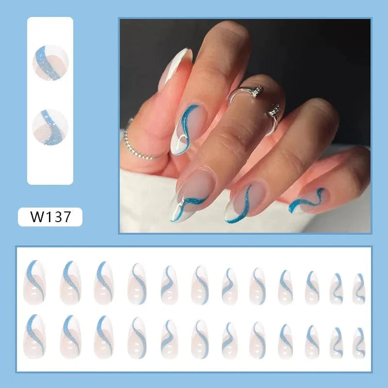 Purple floral almond press-on nails from Showlu Fashion Store, 24-piece acrylic tips with delicate floral design.