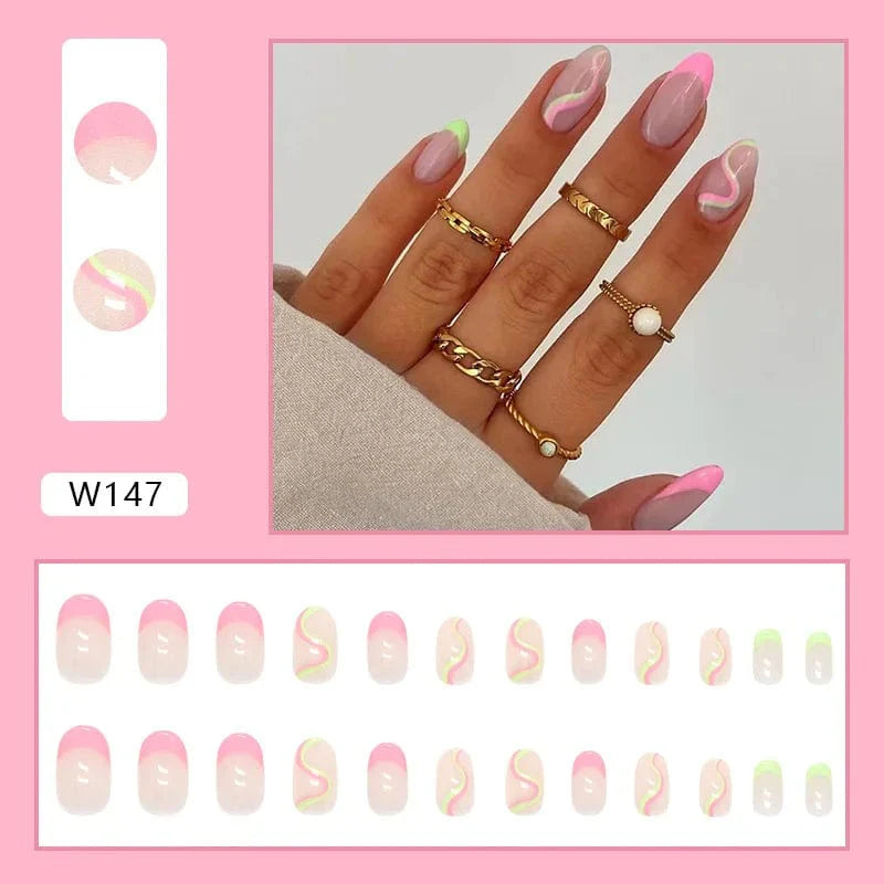 Showlu Purple Floral Almond Press-On Nails, 24-piece set of detachable acrylic tips with floral design and ballerina shape.