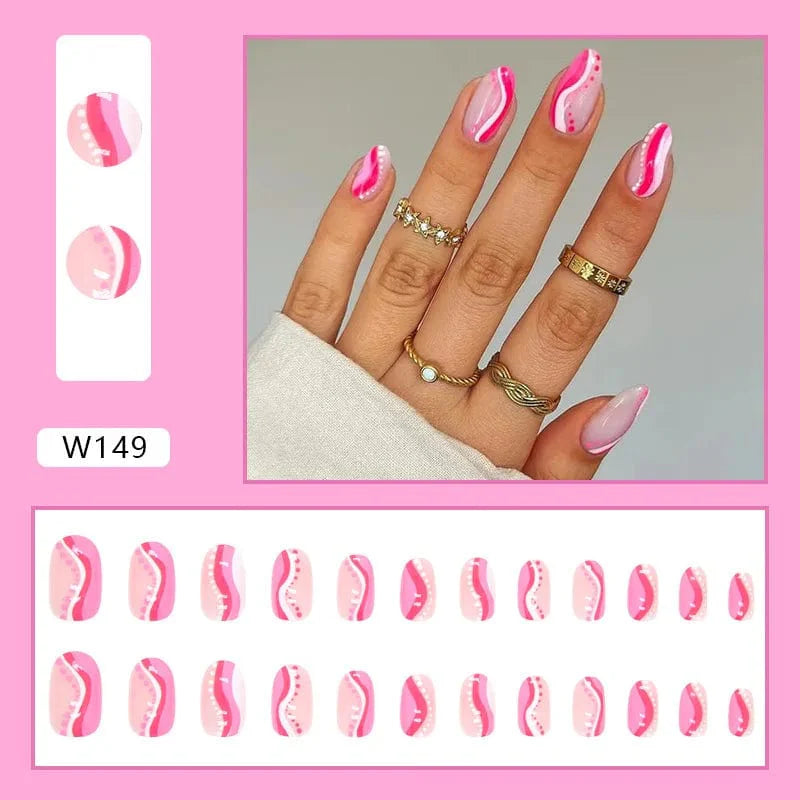 Showlu Purple Floral Almond Press-On Nails with 24 detachable acrylic tips in a box, featuring floral design for stylish manicures.