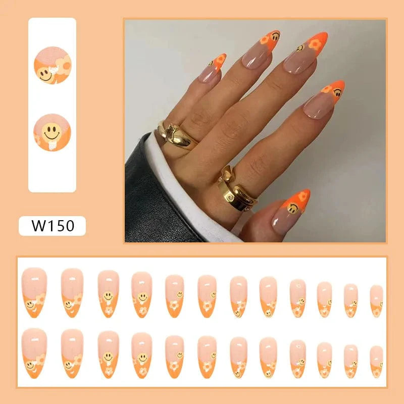 Showlu Purple Floral Almond Press-On Nails, 24-piece set with decorative floral design and detachable acrylic tips for a stylish manicure.
