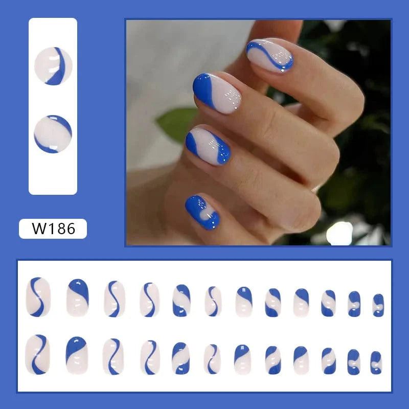 Showlu Purple Floral Almond Press-On Nails with 24 acrylic tips, featuring floral design for a stylish manicure.