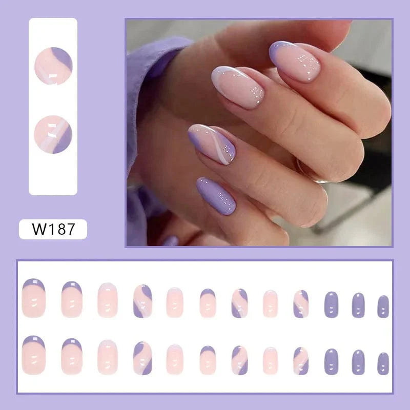 Showlu Purple Floral Almond Press-On Nails with 24 detachable acrylic tips featuring a floral design on a white background.