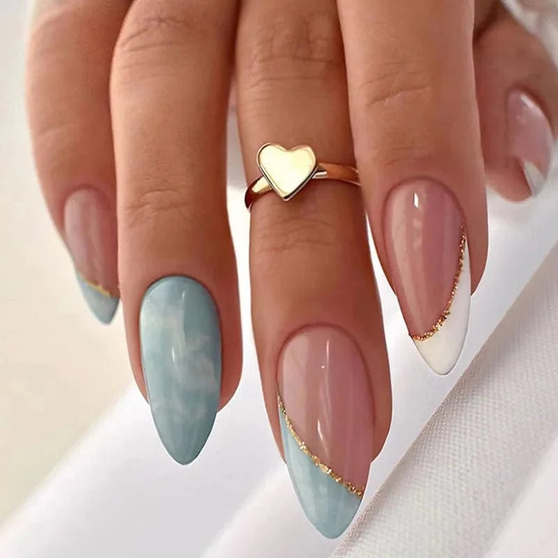 Light green striped press-on nails by Showlu Fashion Store, long coffin acrylic tips with gradient design, worn for a stylish look.