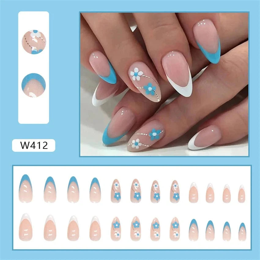 Showlu Purple Floral Almond Press-On Nails, 24-piece set with floral design, detachable acrylic tips for elegant manicures.