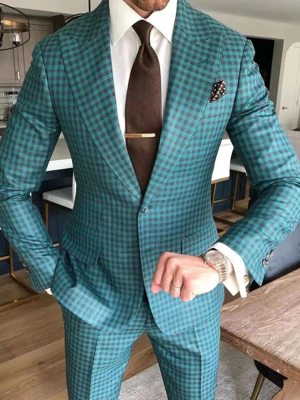 Dark green check slim fit men's wedding suit with one-button jacket, tailored for a stylish, elegant look.