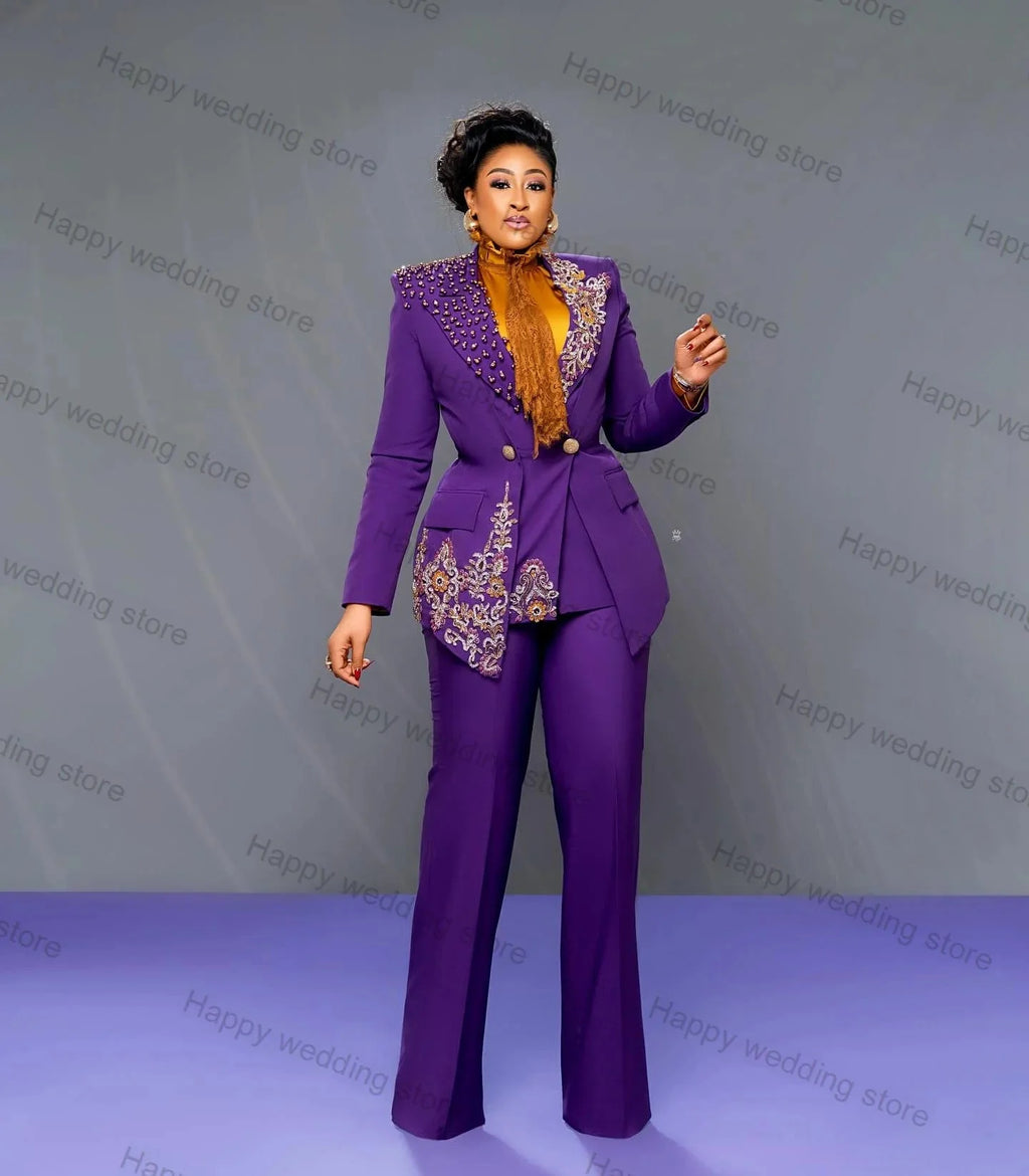 Purple women's 2-piece blazer suit with crystal embellishments, tailored jacket and trousers, suitable for wedding or formal events.