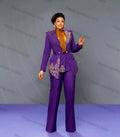 Purple women's 2-piece blazer suit with crystal embellishments, tailored jacket and trousers, suitable for wedding or formal events.