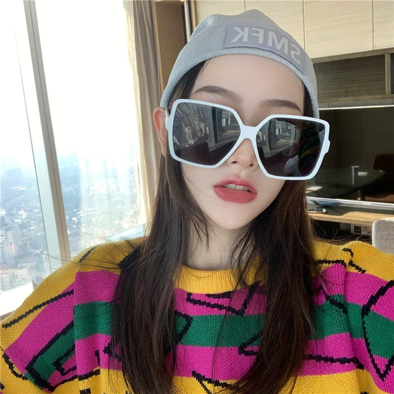 Showlu Women's Oversized Square Polarized Sunglasses with white frame, gray lenses, UV protection, trendy design, and mirror finish.
