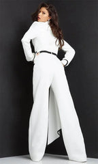 A woman wears a white long-sleeved jumpsuit with a black belt and black trim details.