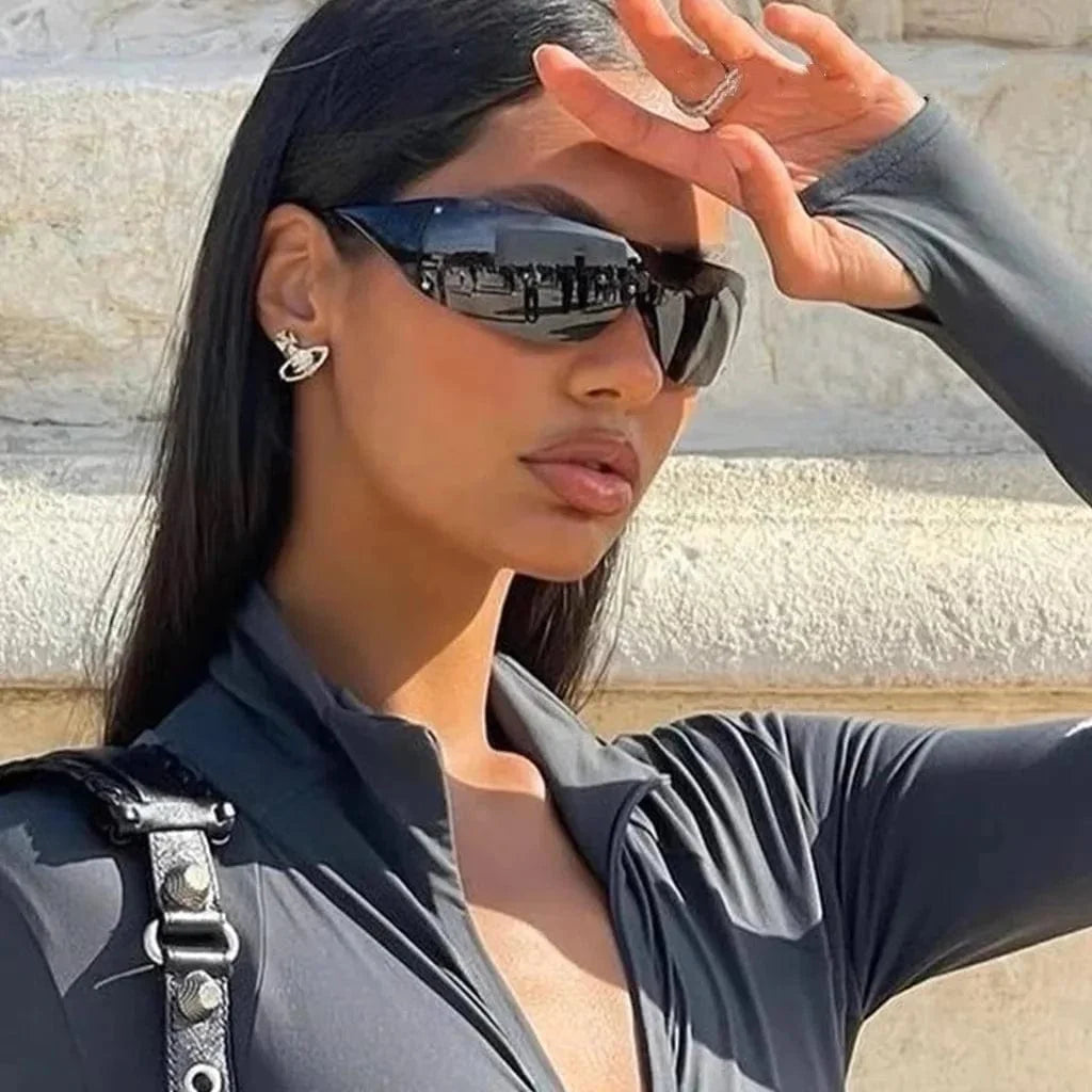 Buyuteen Y2K rimless sunglasses by Showlu Fashion with pink steampunk design, UV400 protection, stylish luxury shades for women and men.