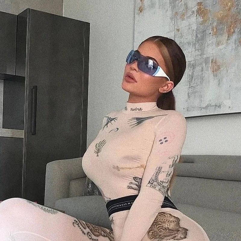 Buyuteen Y2K rimless sunglasses with pink steampunk design, UV400 protection, stylish unisex luxury shades by Showlu Fashion.