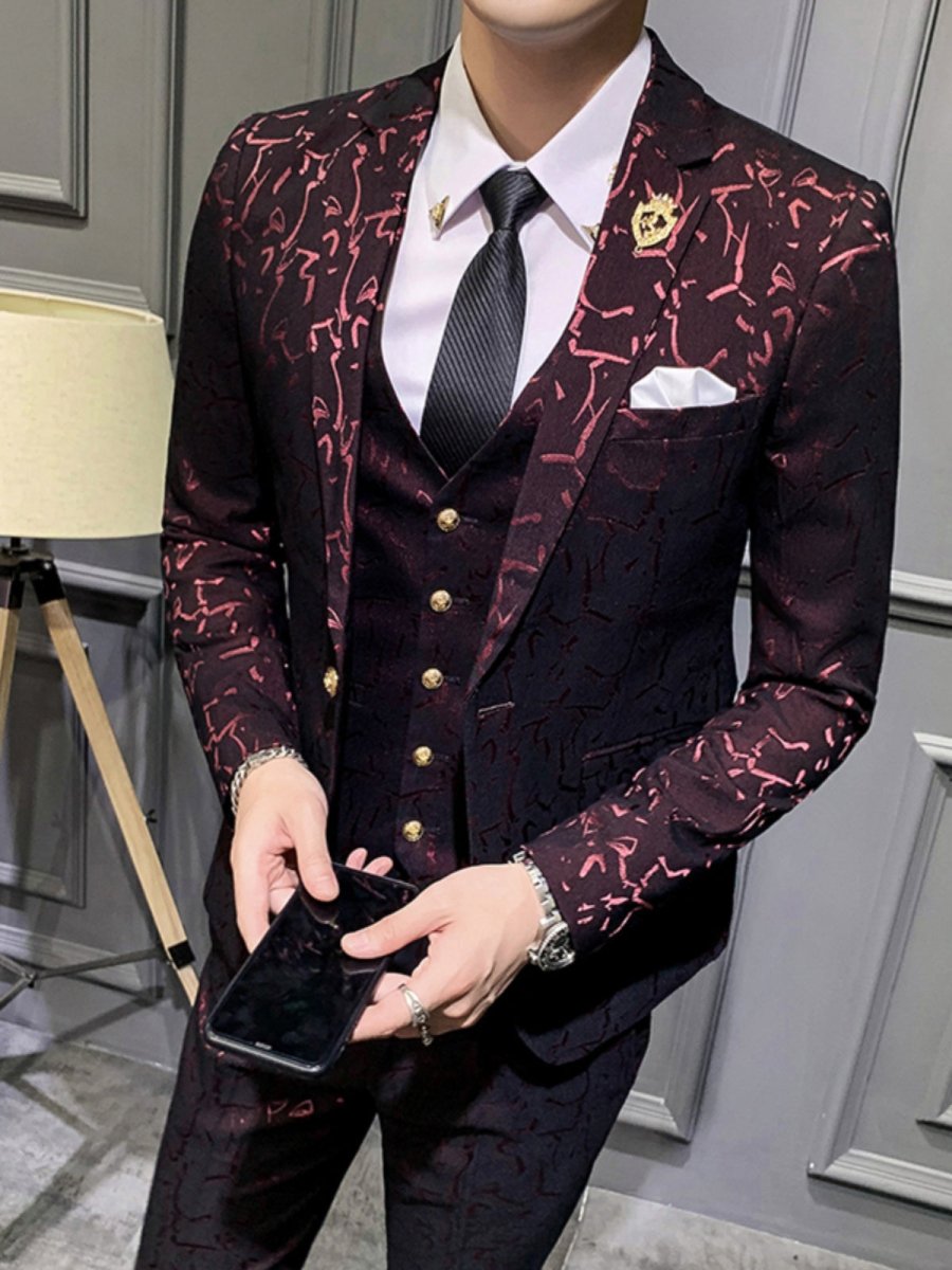 Young man wearing the SHOWLU FASHION STORE floral slim fit leisure suit with one button blazer, stylish and suited for casual occasions.