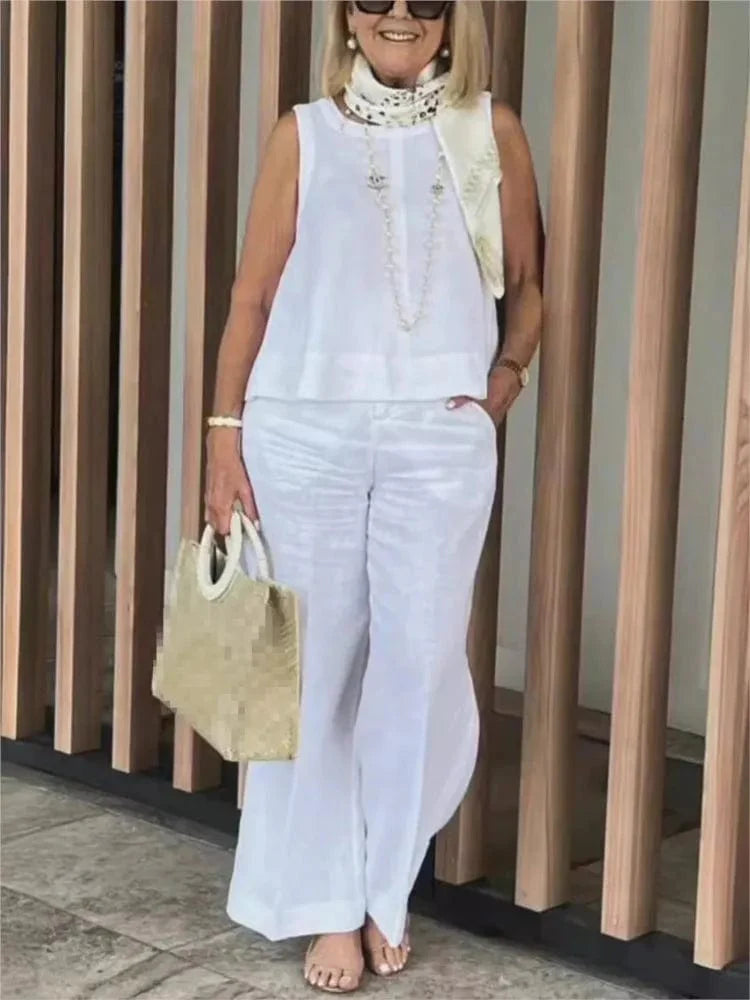 Women's cotton linen two-piece set with sleeveless loose blouse and wide-leg pants, perfect for casual summer fashion.