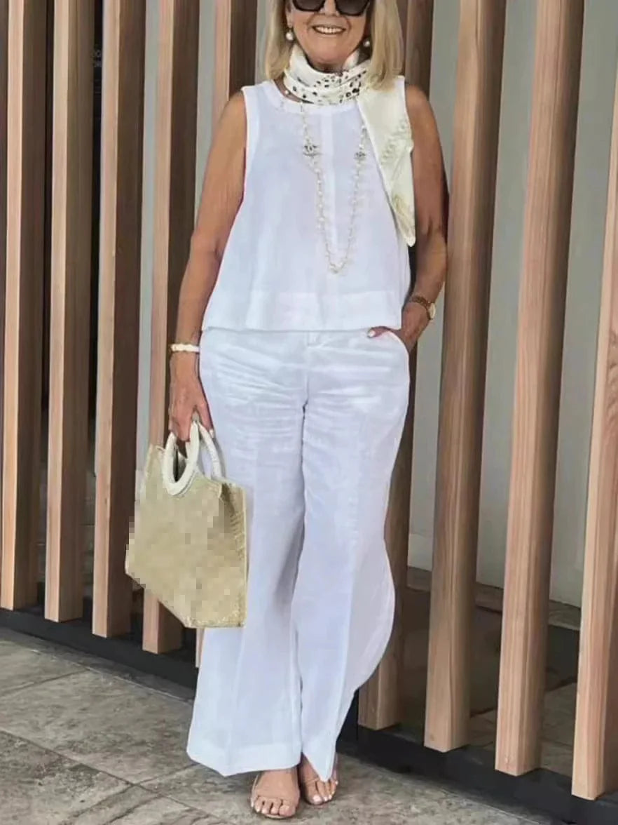 Women's cotton linen two-piece set with sleeveless loose blouse and wide-leg pants, casual summer fashion by Showlu Fashion Store