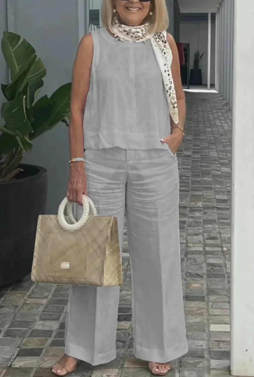 Women's cotton linen two-piece set with sleeveless blouse and wide-leg pants, casual summer fashion by Showlu Fashion Store.