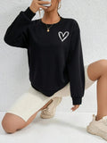 Showlu Fashion Women's Heart Print Fleece Sweatshirt with casual crewneck, featuring a simple heart pattern, warm and comfortable.