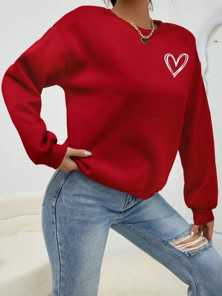 Women's Heart Print Fleece Sweatshirt by Showlu Fashion, casual crewneck pullover with simple heart pattern, cozy and warm fleece material.