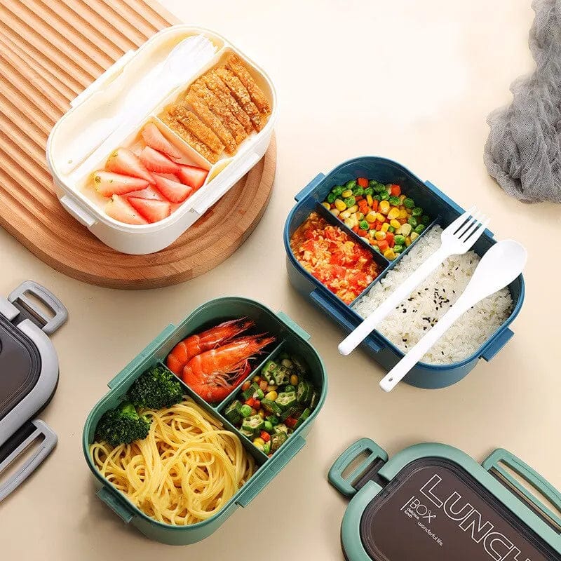 Showlu double-layer 1200ml lunch box with compartments, microwave-safe design, includes fork and spoon for portable meals.
