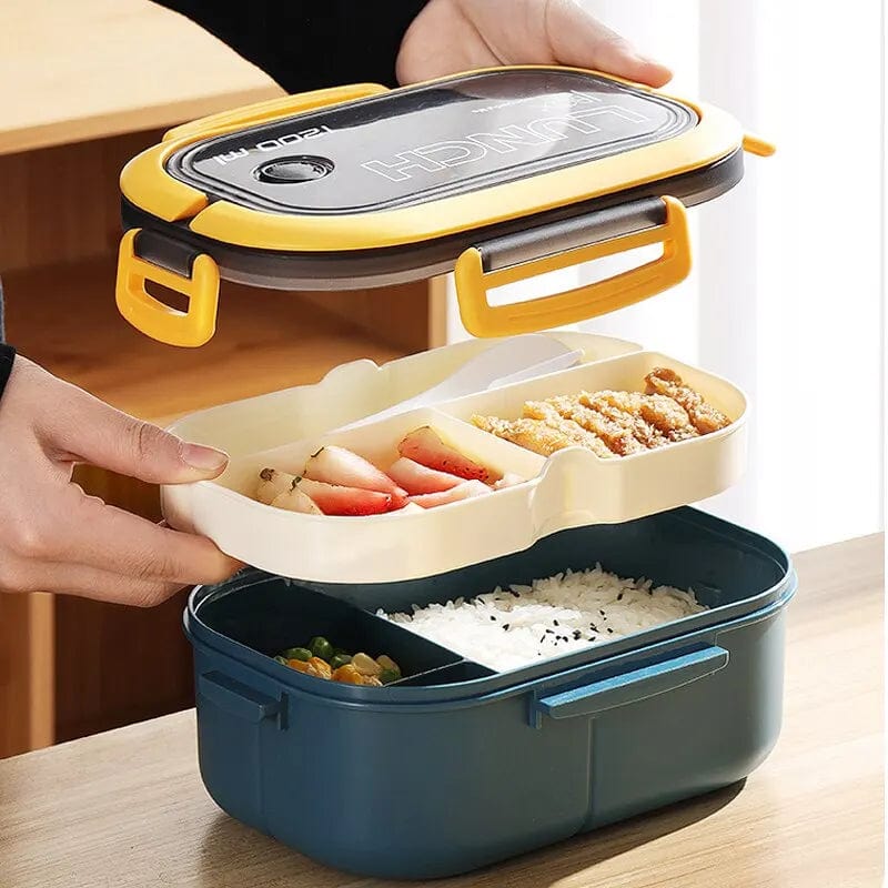 Showlu double-layer 1200ml microwaveable lunch box with utensils, featuring separate compartments for food and fruit.
